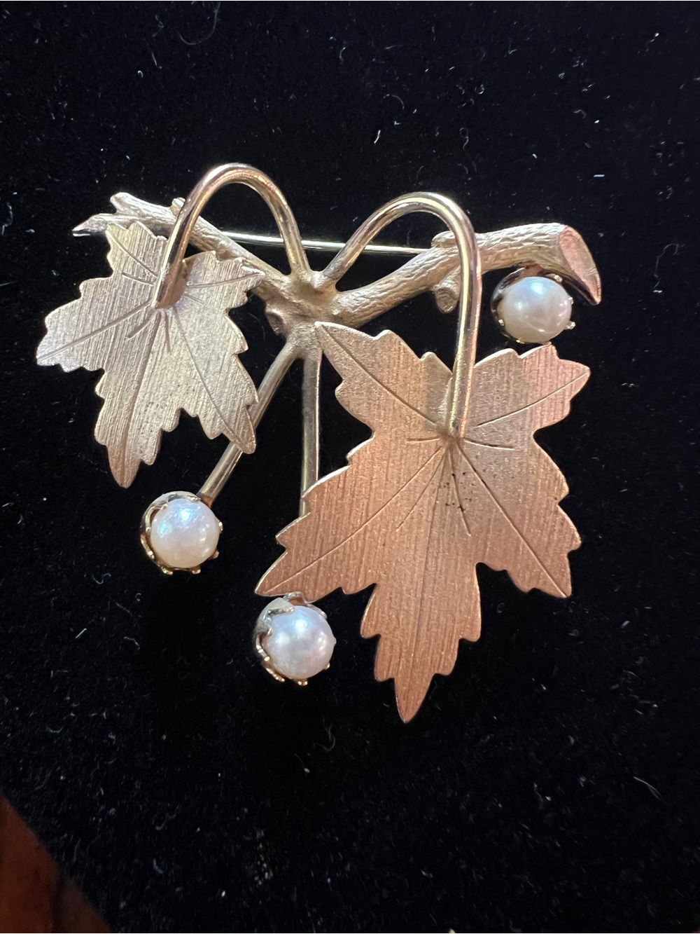 Vintage 1960s Sarah Coventry “Precious” gold tone leaf brooch with three pearls